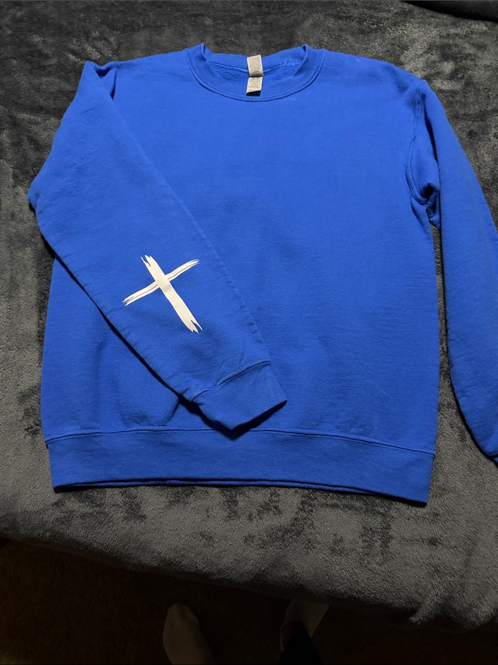 Bright Blue Crewneck Sweatshirt with White Sleeve Cross and Jesus Has My Back